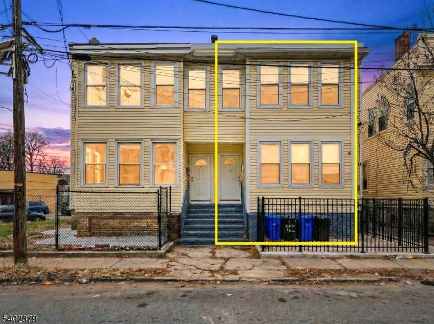 Welcome to Newark! Set in a prime, ultra-convenient location, this property offers quick access to major highways, the airport, New York City, and more perfect for commuters and tenants alike.This recently renovated unit (2024) was redone top to bottom with no detail overlooked. Each unit features 3 bedrooms, 1 full bath, a bright open-concept layout, and spans two levels (half-duplex style) for added privacy and space. Everything is brand new walls, windows, doors, flooring, and beautiful modern bathrooms. Enjoy stainless steel appliances, central A/C, tankless water heaters, recessed lighting, and sleek contemporary finishes throughout.Location, renovation, and value all in one smart purchase.