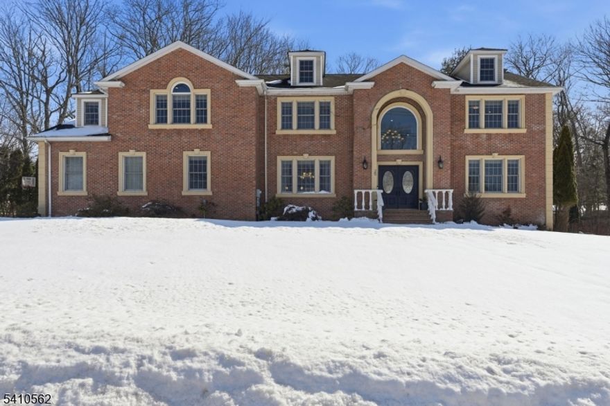 This Spectacular Luxury Home is graciously spread over 4125 sq ft and previously owned by one of Oakland's top builders, featuring the finest materials, combined with today's most sought-after amenities: High ceilings, moldings, wood floors, to name a few.  From the minute you enter, you will be dazzled by the 2-story foyer from which you can see the formal dining room to the left, a den to the right and straight ahead a marvelous large great room with gas fireplace as well as sliders to the back yard, with is paver patio, complete with pergola and a large shed.  The gourmet kitchen is its own paradise featuring custom cabinets, tile backsplash, high-end appliances, granite counter tops, center island and a breakfast area as well. Rounding out the first floor is a full bath, laundry room and a combination mudroom/office.  The upper level is where will find the primary suite fit for royalty, with sumptuous ensuite full bath and a large walk-in closet, as part of 5 bedrooms all on the 2nd level.  For convenience and efficiency, there are 4 full baths and one half-bathroom.  There is even more to celebrate as the finished basement offers a large recreation space, a media room with built in bar, a full bath, a small wine cellar, plus a bonus guest room/office and a utility/storage room; lastly, the basement offers a walkout staircase to a large 3 car garage with charging station for an electric vehicle.  Within 6/10's of a mile, you will find a park and ride, shopping centers.