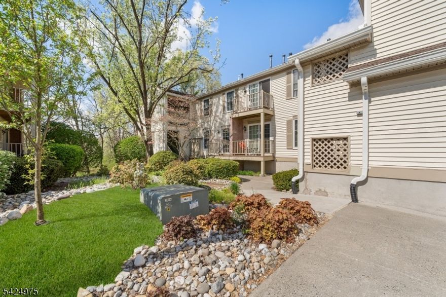 Welcome to this spacious 2-bedroom, 2-bath condo located in the beautifully maintained Adams Village section of Spring Ridge. Set among manicured grounds, this home offers both convenience and a desirable lifestyle. Inside, you'll find a bright and open layout featuring a large living room, a separate dining area, and a kitchen with stainless steel appliances. The unit also includes a private in-unit washer and dryer for added convenience. A beautifully updated bathroom and two generously sized bedrooms provide comfortable living, while ample storage throughout the unit ensures functionality. Private balcony to enjoy morning coffee, unit backs to greenery. This home also includes a large private storage unit, offering additional space and ease of living. Residents of Spring Ridge enjoy access to a clubhouse, a beautiful pool, walking paths, a playground, and tennis courts perfect for both relaxation and recreation. Ideally located close to schools, shopping, and dining, with easy access to Routes 78, 287, and the local train station for commuting. A wonderful opportunity to enjoy low-maintenance living in a vibrant, amenity-rich community schedule your showing today.