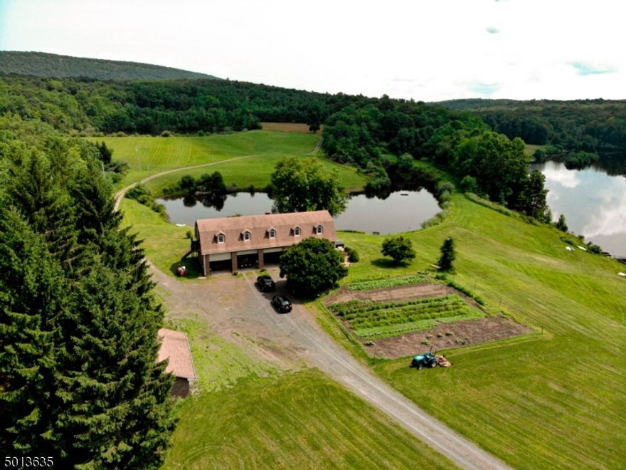 Enjoy multiple ponds,stream,dam, w/ gorgeous lake & mountain views! Acreage both cleared & wooded. Home has beautiful lake views from the large eat in kitchen.Hot tub & built in BBQ overlooking pond! BRs/office/sitting rm/LR/FR each could be utilized for different purposes. Large 22x15 master w/separate bath. Huge 48x14 great rm on top level has water access if buyer would like to add bath and/or kitchen. 15x30 club house has it's own water & septic. 1/2 bath located in 1st floor laundry rm located in huge 48x30 3 car garage w/13ft ceilings. Taxes/assessments listed are for all 3 lots. Private oasis surrounded by nature on an amazing property!!! Property includes 3 adjoining lots all at Block 103: Lot 1=37A Gaisler Rd; Lot 5=47A Gaisler Rd; Lot 9=128 Mohican w/home