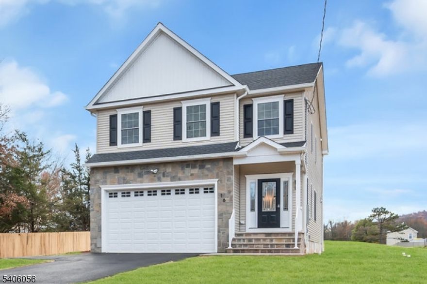 BRAND-NEW construction in the heart of Whitehouse Station, a 2,600 sq foot home. Set within prestigious Readington Township and just minutes from Route 78, this ground-up new build blends modern design, quality craftsmanship, and everyday convenience. Step inside to spacious 9-foot ceilings, wide-plank hardwood floors, and sun-filled spaces that create an effortless flow for living and entertaining. The open-concept kitchen anchors the home with quartz countertops and an oversized center island, seamlessly connecting to the living and dining areas. Upstairs, the primary suite offers a quiet retreat with a tray ceiling, walk-in closet, and spa-inspired bath. Three additional bedrooms provide generous space and flexibility. An 18-kilowatt whole-house generator and a 10-year home warranty add comfort and peace of mind. Select photos are virtually staged to highlight scale and potential. Brand new construction, beautifully finished and built to last.