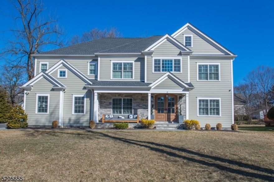 Center Hall Colonial built in 2016 with 3 finished floors totaling approximately 4,200 square feet. Gorgeous curb appeal with front porch, stone, Hardi plank siding and side loading garages. Newly installed outdoor kitchen and gas firepit with extended rear patio. 1st floor features mud room with custom cubbies, 2 story entrance foyer, powder room, eat in kitchen open to family room, formal dining room with butler's pantry, living room and bedroom with full bath. The 2nd floor has 2 bedrooms with Jack and Jill bathroom, a single bedroom with its own full bath, laundry room with cabinetry and sink and finally the large Primary bedroom with his and hers walk in closets, sitting room and full bath complete with clawfoot tub and large steam shower. The third floor is completely finished with a full bath. This is terrific flex space for an office, playroom, or 6th bedroom. So many well thought touches throughout the house such as built ins in living room, Sonos speakers in many rooms, custom desk space on 2nd floor overlooking 2 story foyer, 9' ceilings on 1st and 2nd floor, central vac, 4 Zone HVAC and gas fireplace in family room with opulent trim package.