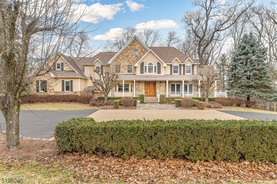 Totally custom designed and executed. Wonderful 9' ceilings up and down plus volume ceiling in FR and Foyer.  Mahogany library, specialty flooring.  Travertine countertops in the prof. designed Kit w breakfast room.  Finished walkout LL w/kitchenette and Leisure rooms/exercise room and mirrors/shop w. dust exhaust/office. Light and bright on every floor w/quality throughout.  Amazing hand carved front doors great buyers from the rocking chair porch all the way to the Clerestory Great room and the open sun patio w/kitchenette  First fl BR and bath for visitors and 4 BRs/3F bths on the second fl. Luxurious primary suite w/fp, balcony, and two lg walk in closets w/storage, steam shower in MBath. The backyard has a fenced in area which is currently being used as a garden but easily converted to play area or pet enclosure. Sound system included plus ARLO security cameras.25 minutes to Newark Airport!  Come see!  You won't be disappointed.  Check out the floor plans after the pictures. FIOS is currently being installed on the street! Square footage is 4846 plus walkout lower level as per town records