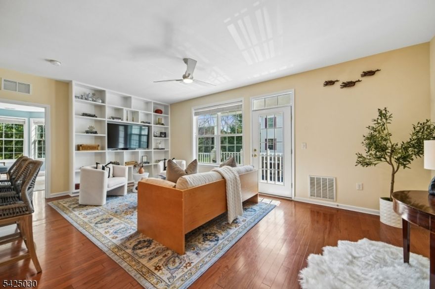 Beautiful Begonia model filled with sunshine and bright, open living spaces! The refreshed kitchen features a new electric stove and cooktop, elegant backsplash, updated hardware, bright new countertops, and cabinetry finished all the way to the ceiling no open gaps for a clean, custom look.The spacious primary suite offers an enormous closet and serene views of the park and trees in bloom. Enjoy your morning coffee on the private terrace overlooking adjacent walking paths and lush greenery.Additional highlights include a private in-unit laundry room, attached first-floor private garage access, and a large storage space.The Four Seasons lifestyle amenities are truly unmatched: craft/card room, billiards room, ballroom, fitness center, indoor pool, terrace room, outdoor pool, bocce courts, tennis courts, and pickleball all set against stunning views of the NYC skyline.