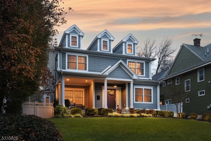 An open front porch invites you to this meticulous 6 bedroom, 6.1 bath home offering 4 spacious floors of living space.  First floor enjoys a living room w/custom moldings open to the formal dining room with bay window.  The gourmet kitchen boasts tops of the line SS appliances, center island breakfast bar, granite countertops and separate dining area open to the family room with box ceiling and gas burning fireplace surrounded by custom built-in storage and transom windows. A convenient first floor bedroom suite with private bath, mudroom room and powder room complete the main level.  The second level is home to the primary bedroom suite featuring a gas fireplace, dual walk-in closets and private bathroom with dual sink vanity, jetted tub and stall shower. Also found is a bedroom suite with private bath, Jack & Jill bedrooms with bathroom and a convenient 2nd floor laundry room.  The private third floor includes a bedroom with a full bath.  Additional living space is found on the finished lower level boasting a expansive rec room, gym and full bath. Outside the professionally landscaped grounds include a paver patio, privacy fence, and detached two car garage. The combination of spacious, thoughtfully designed interiors and a beautifully landscaped exterior makes it a perfect place for both relaxation and entertaining.  The location is also incredibly convenient for those who want access to excellent schools, award winning downtown, and easy transportation to New York City.