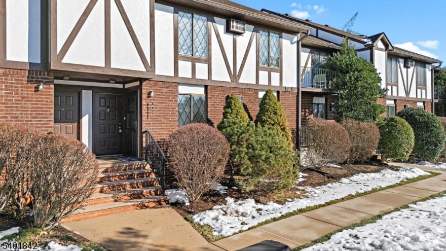 Welcome to this newly renovated 1 bedroom, 1 bath first floor condo in Wildflower Village, offering views of the peaceful courtyard.  This move in ready home features luxury vinyl plank flooring throughout, new windows (2025), and a new water heater (2025).  The kitchen boasts beautiful wood toned cabinets, open accent shelving, stainless steel appliances, and even a refrigerator that makes round ice cubes, a true modern touch!  Laundry is conveniently located on the main level with washer & dryer included.  The partially finished basement, painted and carpeted in neutral tones, offers a versatile rec room, office space, and additional storage.  Ideally located near major commuting routes, shopping, schools, and parks, with a commuter bus to NYC just 1 mile away, this home combines comfort and convenience.  Enjoy community amenities including a pool, tennis court, basketball court, and playground, making this condo the perfect choice to start your new year of homeownership!