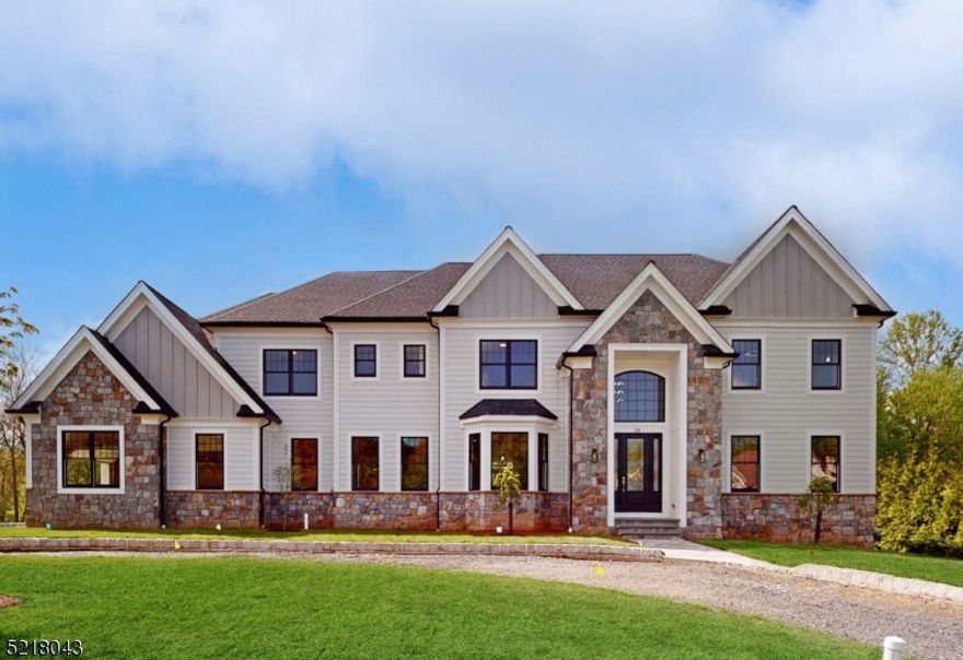 Welcome Home! Another beautiful home designed and built by Warren Construction in the desirable Sycamore Estates neighborhood.  This extraordinary home includes 7 bedrooms, 6 full bathrooms and 1 half bathroom.  Boasting nearly 7,600 square feet of living space throughout all three finished levels, you will find high end finishes around every corner such as 9' ceilings, gourmet custom kitchen with porcelain countertops and backsplash, GE cafe appliances, mud room, walk in pantry, first floor guest bedroom, first floor office, and so much more!  There are endless possibilities in the 2,200 square foot finished walk out basement. This house has it all with convenience to Warren's highly rated schools & close to downtown shopping area, as well as routes 78, 287 & 22!