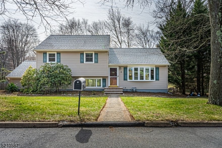 Rock Ridge Lake living with Cook's Pond Views. Waterfront property on Corner lot on quiet, dead end street. Lots of Generous Room Sizes across 4 floors to Spread Out & Make Your Own! Bright & Sunny living space. 1st Floor offers a large living room and eat-in kitchen. Downstairs, family room w/ full bath & walkout to large, fenced in backyard & paver patio. TONS of Storage in 1.5 car garage & unfinished bsmt. 3 bedrooms & full bath upstairs. Hardwood floors. An ideal spot to relax & enjoy life. Lots of parking. Just a stone's throw from Cook's Pond with playground, beach and walking trails or Rock Ridge with their clubhouse, beach and boating! Tons of activities for all ages. Minutes to DWTN Denville -a vibrant dwtn with shopping, restaurants & events. NYC Direct mass transit & major hwys. Kitchen renovated in 2016 & upstairs bathroom in 2021. Hardwood floors under carpet in living room, stairs up to bedrooms and hallway outside of bedrooms. No hardwood on stairs down to family room or family room. (As per seller's knowledge)