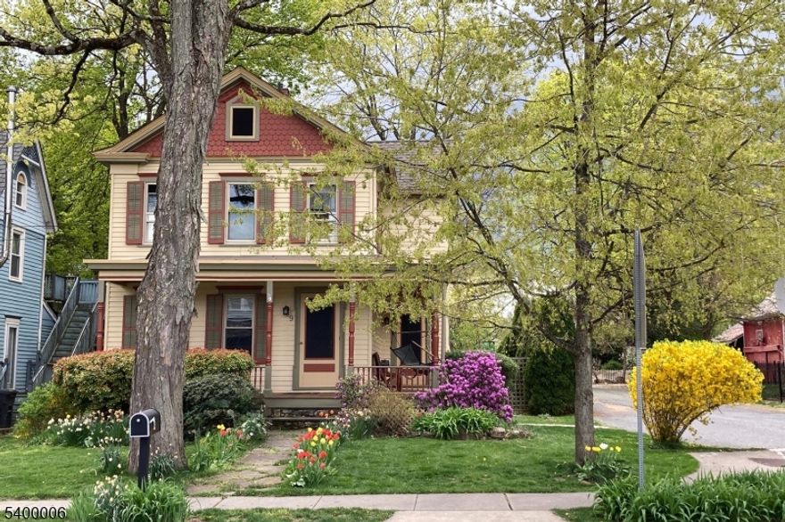 This updated Victorian home with public utilities in the heart of the Annandale featuring classic architectural details is a rare find, blending timeless architecture, modern conveniences, and the charm of small-town living in a historic village location with highly-rated schools and easy access to commuting options. Plentiful light and period details (e.g., wood floors throughout, secondary Jersey winder stairs) are married with newer modern amenities increasing the energy efficiency of the home (e.g., solar panels (2019), HVAC (2021), roof (2012), and windows (2019)) and convenience of daily living (e.g., large kitchen, first floor office, first floor laundry, public utilities). A separate garage/workshop with its own electrical service provides space suitable for work, hobbies, etc and features EV charger. Exterior features include updated mahogany covered porch, mature perennial gardens in front and backyards, and level backyard with firepit-ready area and fish pond. Exceptional neighorhood setting 0.3 miles to Annandale NJTransit train station,  0.7 mile to commuter bus station, easy access to routes 78, 22, and 31, and minutes to historic downtown Clinton and the natural beauty of local reservoirs, hiking trails, cycling roads, and equestrian facilities. This home offers a unique opportunity to own not just a house, but a move-in ready piece of history in one of Hunterdon County's most charming villages.