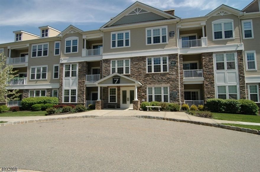 Welcome to Greenbriar at Fox Ridge! Come see this sun-filled, beautiful, 2 bedroom, 2.5 bath Ramapo model on the 1st floor. The oversized primary suite boasts two walk-in closets, large granite-topped vanity, and walk in shower. Newer wall mounted TV included. An equally impressive second bedroom has its own full bathroom and walk in closet. Kitchen has granite countertops, matching stainless steel appliances with accompanying breakfast bar. A well-lit den off living room gives ample opportunity for an office. Side by side new washer and dryer in unit. Garage parking with extra 10' x 10' storage unit. Plus everything this idyllic community has to offer including large clubhouse with heated indoor pool and sauna, a fitness center, art room, billiards room, card/activity room, outdoor pool with a pavilion, tennis & pickleball courts, dance/aerobics studio, community garden with individualized plots, hiking trails and much more! Short drive to Rockaway Mall, dining, endless activities. NYC is just under an hour away. As is sale. Some photos virtually staged; Primary bedroom carpet was removed and replaced with matching wood laminate after photos taken.