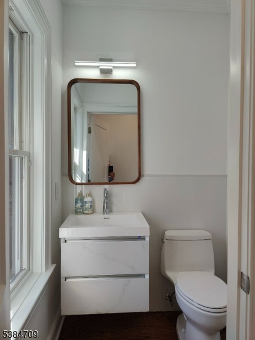 Beautifully designed townhouses in the heart of town, within walking distance to all Summit has to offer. Contemporary design with easy flowing, boasting open layout and classic features. Chef's kitchen w/ top of the line SS appliances. Wide plank hardwood flooring throughout. Commercial grade security system and state of the art camera system for peace of mind while you are away. Oversized 2-car garage w/ EV power capability. Outstanding 3rd floor attic w/ skylight and ample storage. All that plus a finished basement awaits you at the end of your day! Landscaping by acclaimed local designer Ed Clark.