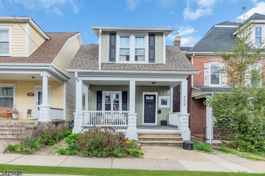 This Cape Cod is bursting with charm and character, starting with its welcoming rocking chair front porch and intricate woodwork details throughout. An all-season enclosed back porch offers a cozy nook to enjoy all year long.Inside, you'll find a bright living room seamlessly open to the dining area, perfect for gatherings. The kitchen features ample cabinet space and easy access to the back porch and powder room. The home boasts three comfortable bedrooms, a full bathroom, and a convenient powder room.Step outside into a fenced-in yard that's ready for your outdoor enjoyment, complete with awnings, patio spaces, and multi-level areas to explore. A detached two-car garage with a loft provides fantastic storage options.The home has been thoughtfully updated with newer siding, windows, and a roof. You'll also enjoy natural gas heat, abundant closet space, and a partially finished basement with a built-in bar area great for entertaining. The laundry area offers even more storage solutions.Situated near major roadways like Routes 78 and 22, this home is conveniently close to shopping, restaurants, farmers markets, and all the amenities you need. It's truly a place where charm meets convenience!