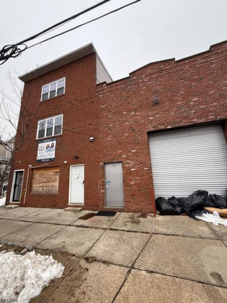 Exceptional investment opportunity featuring a 3,500 sq ft warehouse/storefront situated on a 50x100 lot. The property also includes two fully renovated 2-bedroom residential apartments above. All units are vacant, offering immediate flexibility for an owner-user or investor to set market rents. The warehouse space provides excellent versatility for retail, light industrial, distribution, or contractor use. Renovated residential units are move-in ready. Ideal for business owners seeking live/work potential or investors looking to maximize income.