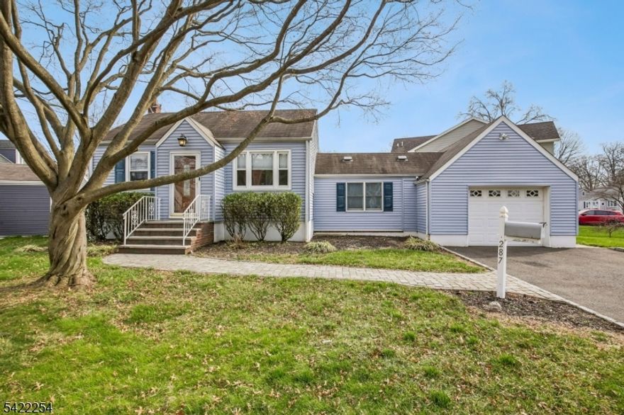 Charming and well-maintained ranch-style home situated on a desirable corner lot in a great neighborhood near downtown Kenilworth! This 2-bedroom, 2-bath home offers easy one-floor living with a bright and inviting layout. The kitchen features classic wood cabinetry, a tile backsplash, and flows nicely into the living space, perfect for everyday living and entertaining. A cozy den with sliding doors leads directly to the deck, creating a seamless indoor-outdoor experience. The finished basement adds valuable additional space, complete with a large recreation room, full bath with a stall shower, and laundry area. Enjoy outdoor living with a beautifully repainted wood deck overlooking a fenced-in yard with a durable vinyl fence, plus a spacious paver patio perfect for gatherings or relaxing. Additional highlights include an attached one-car garage with newer automatic openers, driveway parking for up to 3 vehicles, easy-maintenance vinyl siding, and a storage shed. Also features a 2-year-old gas furnace for central heating, 200-amp electrical panel, central air conditioning, and a smart thermostat for modern comfort and efficiency. Conveniently located near schools, parks, shops and restaurants in downtown Kenilworth, with easy access to major highways and NYC bus transportation, making commuting a breeze. A great alternative to a condo or townhouse, this lovely home offers a perfect combination of comfort, functionality, and location. Hurry, this will not last!