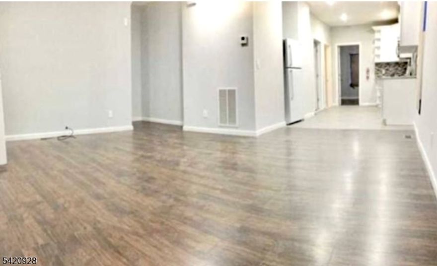 Welcome home to this beautifully newly renovated 2 Family 1st floor unit. Landlord provides water along with maintenance for lawn care/snow removal! The first floor includes: eat in kitchen, open floor plan living room/dining room, 2 bedrooms, full bath, small deck for bbqing and private backyard off of master. All appliances are new: refrigerator, dishwasher, gas stove, microwave. Available street parking. Pets welcome! Basement storage. Local attractions include: Irvington Park with Soccer field, pond, park, softball. Close to Maplewood country Club, South Orange Village and plenty of multi-cultural eateries/grocery.