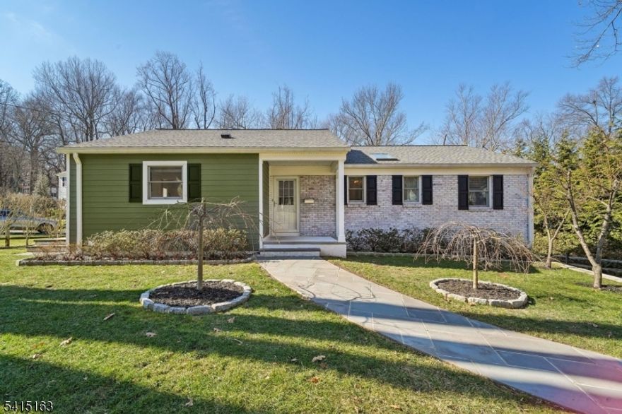 Rare opportunity to own a bright and beautifully maintained ranch on a quiet cul-de-sac in the highly sought-after Tall Oaks section of New Providence. This home features an updated kitchen with a large center island, plenty of cabinetry, modern stainless steel appliances, and ample counter space, with an open connection to the dining room perfect for everyday living and entertaining. The first floor also includes the airy living room with a large picture window overlooking the beautiful backyard, filling the home with natural light. The primary bedroom offers great closet space and an en-suite bathroom with a new glass shower door, complemented by two additional bedrooms and a beautifully finished main bath, all conveniently located on the first floor. The ground floor features a large office with a new powder room, a bright family room with walkout access to the backyard, and a convenient laundry room. Outside, enjoy a level lot with a patio, outdoor pizza oven, and an amazing storage shed with electricity perfect for a gym, art studio, or workshop. A two-car garage completes this exceptional home in one of New Providence's most desirable neighborhoods. Truly, a remarkably well-maintained home throughout. The home includes freshly painted interiors, a newer roof, driveway, bluestone walkway and patio, windows, water filtration system and a whole house generator.  Close to schools, parks, train station, major transportation.