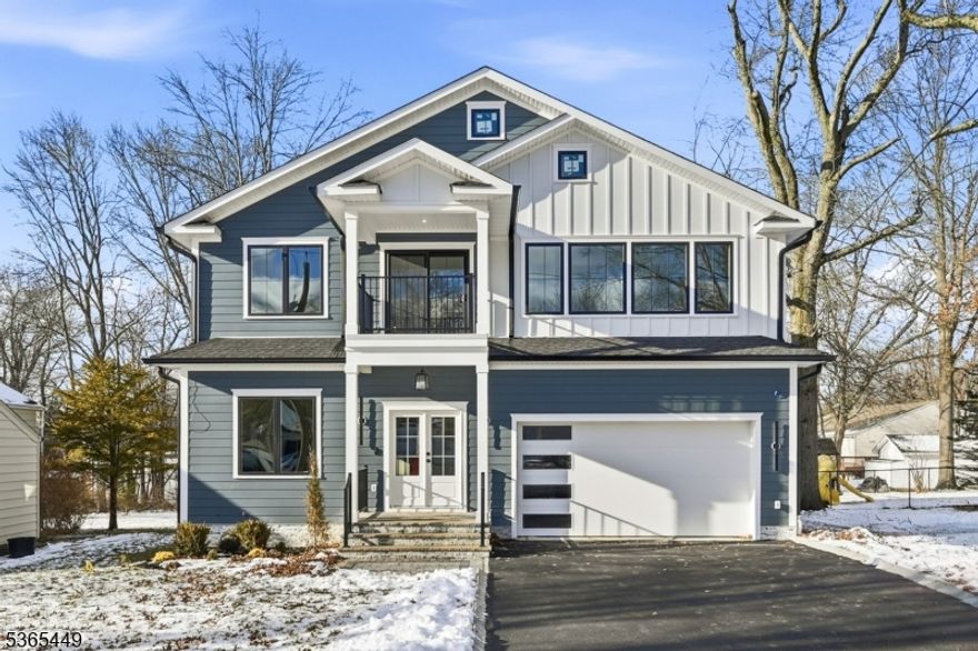 Welcome to this stunning 5 bedroom, 5.5 bathroom Colonial offering over 5,100 sq ft across three finished levels, with every bedroom featuring a private ensuite. Main level includes formal living and dining rooms, guest suite, and powder room. Chef's kitchen offers premium stainless steel appliances, custom cabinetry, quartz countertops, center island, and walk-in pantry. Double-height family room with fireplace opens to a private, fenced-in backyard. Second level features a luxurious primary suite with dual walk-in closets and spa-like bath, plus two additional ensuite bedrooms and second-floor laundry. Finished lower level includes recreation room, wet bar, media room, and fifth ensuite bedroom. Additional highlights include a two-car garage and 10-year builder's warranty. Conveniently located near schools, parks, shopping, and direct NYC transportation.