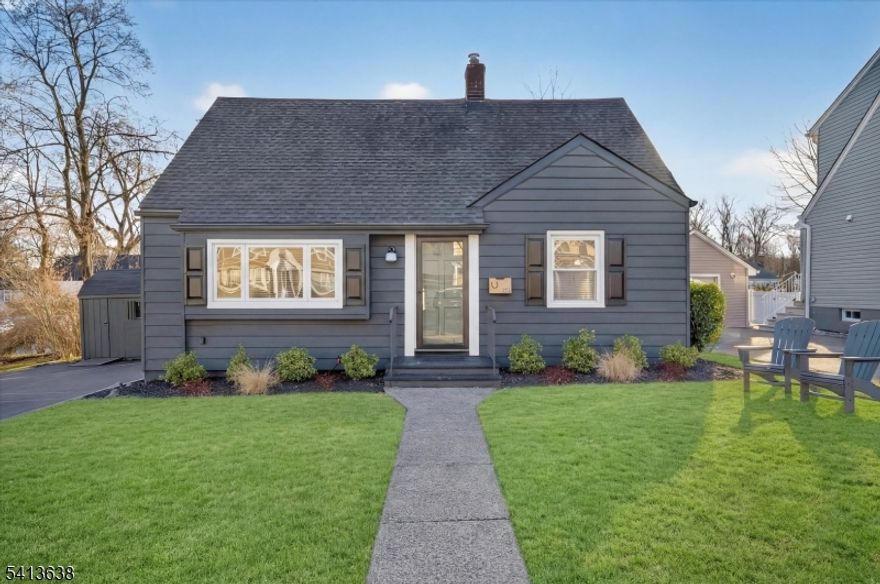 Picture-perfect Cape in one of Verona's most desirable neighborhoods. A rich dark exterior accented by white windows and black shutters creates timeless curb appeal.Inside, a bright white palette pairs beautifully w/ gleaming hardwood floors and recessed lighting. The remodeled kitchen anchors the home and flows seamlessly into the formal living and dining rooms, ideal for both everyday living and entertaining. Features include light gray cabinetry, quartz counters, tiled backsplash, stainless-steel appliances, and a center island w/ farmhouse sink, pendant lighting, and seating for four. A pantry cabinet and beverage center w/ wine refrigerator add convenience and style.The dining room is enhanced by dramatic floor-to-ceiling panel molding. A side entrance leads to a newly installed composite deck spanning the length of the home, complete w/ electric retractable awning and overlooking the manicured backyard. Two main-level bedrooms share an updated hall bath w/ walk-in shower. Upstairs offers two additional bedrooms and a second remodeled full bath w/ shower-over-tub. The finished lower level features new luxury vinyl plank flooring, a spacious laundry room w/ newer front-loading washer and dryer, flexible space for gym or hobbies, and ample storage area with bilco door to backyard.Additional updates include newer roof, central air, boiler, and windows. Convenient to top-rated schools, the Verona pool, shopping, and major transportation routes.