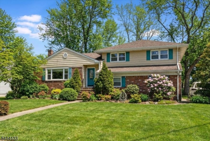 Beautifully maintained custom home set on a prime, level corner property in one of Westfield's most desirable locations.This exceptional home offers an unusually spacious living room and dining room, perfect for both everyday living and elegant entertaining. The eat-in kitchen opens seamlessly to a stunning all-window family room addition, creating a sun-filled retreat that brings the outdoors in while remaining fully heated and air-conditioned for year-round comfort.This space is enhanced by soaring vaulted ceilings that flood the home with natural light. Newer windows throughout further elevate the bright & airy feel.A comfortable lower-level den provides additional flexible living space ideal for a home office, media room, or playroom. Spacious primary ensuite, additional bedrooms & hall bath complete the second level. Basement features high ceilings & offers excellent storage or future finishing possibilities.Thoughtful updates throughout provide peace of mind, including a new furnace (4 months old), central air system (2018), hot water heater (2019), and a roof approximately ten years young.Enjoy outdoor living on the expansive rear deck overlooking the beautifully level property, perfect for relaxing or entertaining.With its generous room sizes, abundant natural light, & highly desirable location close to downtown, top-rated schools, parks, and transportation, this special home offers the perfect blend of comfort, style & convenience - truly move-in ready!!