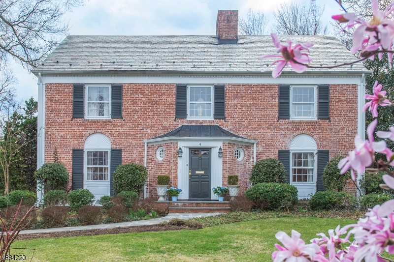 Gracious, totally updated CH Brick Colonial in the heart of desirable Erwin Park! Relaxed elegance in countryside setting, close to NYC train, town & Edgemont Pk. Boasting rich architectural details! New gourmet kitchen has it all: subzero, Wolf 6-burner, large marble center island & light-filled breakfast rm overlooking lush gardens. 1st fl: formal LR & DR plus office & great rm w cathedral ceiling & gas fireplace. Beautiful curved staircase leads to 2nd fl w serene Master BR, luxurious new bath & lg WIC, 3 additional sunny bedrooms & 2 more new full baths on 2nd flr. 3rd fl: 2 large bedrooms- one a yoga room, the other a guest bedroom- plus another full bath. Basement is perfect for games & movies by the fire. Dine alfresco on the screened porch overlooking park-like yard. A true residence of distinction!