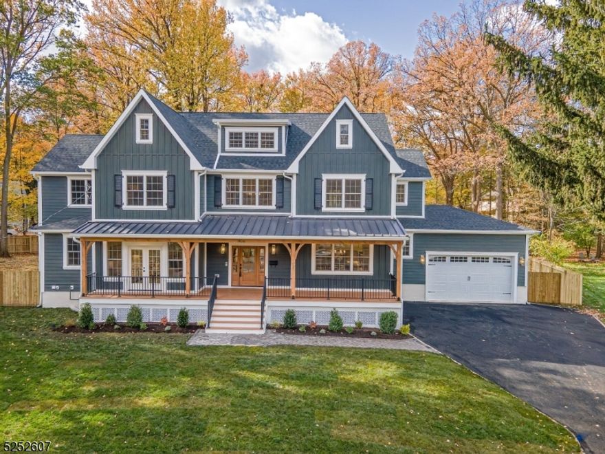 TOTAL RENOVATION & ADDITION! Luxurious 7 bedrm 5.1 bth dream house located in the Parkwood section of Scotch Plains!  Show stopping Colonial w/ 5 inch solid oak wood floors thruout, combines both detailed craftsmanship & functionality.  1st flr features a soaring  2-story foyer, fabulous gourmet kit w/ double thick Quartz countertops, an oversized center island, extra wide farmhouse sink, SS appl, 6 burner Viking stove/oven, a wine/coffee bar w/wine fridge, stunning backsplash, under/over/toe kick cabinet lighting & a sliding door to fenced backyard w/Trex deck, a lg custom WI pantry w/quartz countertops, cabinetry & floating shelves, an elegant DR w/coffered ceilings, a bright impressive family rm w/touch remote gas fireplace surrounded by Carrara marble, LR w/oak ceiling & French doors to front porch, an ensuite w/bth, private office & mudrm w/custom bench & closet. 2nd flr boasts a dramatic primary bedrm suite w/cath ceiling, enviable custom WI closet w/ island & bench, a spa like bathrm, 2 sinks, soaking tub, shower stall w/ bench, shower heads, radiant heat floors & water closet, 4 addit. bedrms (Jack & Jill set up) all custom closets, laundry rm w/ sink, cabinets, folding counter & rod for hanging clothes. 3rd fl. walk up attic is unfinished w/endless possibilities! Rounding out this spectacular home is a finished basement w/bedrm, full bath, rec rm, gym/game rm & plenty of add. storage. Located close to excellent schools, full day Kindergarten, shopping, trans to NYC.