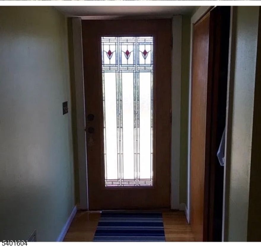 Nice and cozy and very spacious Colonial that boasts 3 BRs and 2 full baths with a great view of the Watchung Lake, skylight, ensuite bathroom in the Master Bedroom, slider to private patio and parking for at least 5 cars. Close to all, shopping, places of worship, parks, I-78, Rt. 22, I-287, I-95. Easy hop onto NYC or Pennsylvania or the Jersey Shore. Excellent Blue Ribbon school system.  Sought-after neighborhood. Enjoy your stroll around the Watchung Lake!