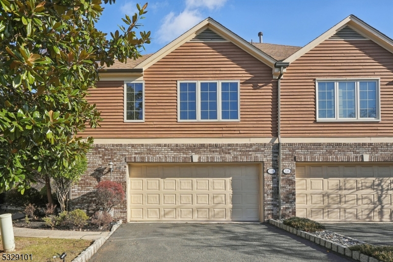 This charming home in Union Township offers a spacious and comfortable living experience, featuring 3 bedrooms and 3.5 well-appointed bathrooms. Walk in to a bright two-story foyer entrance that welcomes you in with gleaming hardwood floors and adding to the home's appeal is an abundance of natural light. The open-concept design seamlessly combines the dining and living spaces, creating the perfect atmosphere to host in; with the convenience of a powder room on the main first floor.The updated kitchen boasts stainless steel appliances and beautiful granite countertops, perfect for both everyday cooking and entertaining with ample counter space and storage. The dining room leads you to the private deck offering a perfect spot for relaxing. The primary suite is a standout, offering a private balcony, a large walk-in closet, an updated luxurious full bathroom, a stand-up shower, and soaking tub. While a fully finished walk-out basement includes a sitting room, office space, gym room space, full bathroom, and a private sitting area with peaceful wooded lot views. The property includes a spacious 2-car garage for convenient. Tastefully updated bathrooms throughout provide modern convenience and comfort. With its functional design, ample storage, and desirable location; this home is a great opportunity for those seeking both style and convenience! Excellent commute to the City with convenient train lines, a bus stop within walking distance, and many options for shopping and dining.