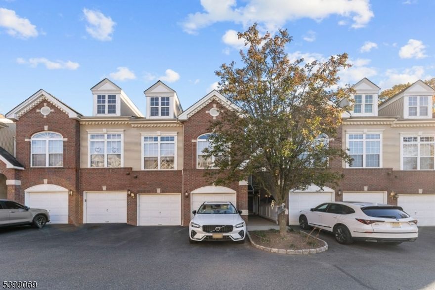 Welcome to 226 Riverwalk, a well-maintained duplex 2-bedroom, 2.5-bath condo offering the feel of a true home at an accessible price point. This residence features central air, a working fireplace, high ceilings, and recently updated kitchen and bathrooms, along with a smart two-level layout that provides privacy and space for everyday living. The home includes a dedicated washer/dryer and utility room, private outdoor space, and two deeded parking spaces: one covered, attached garage and one outdoor. Community amenities include a swimming pool and tennis courts. Located steps from direct NYC bus service and minutes from Clifton's best shopping and dining, this is an ideal opportunity for first-time buyers seeking comfort, convenience, and long-term value.