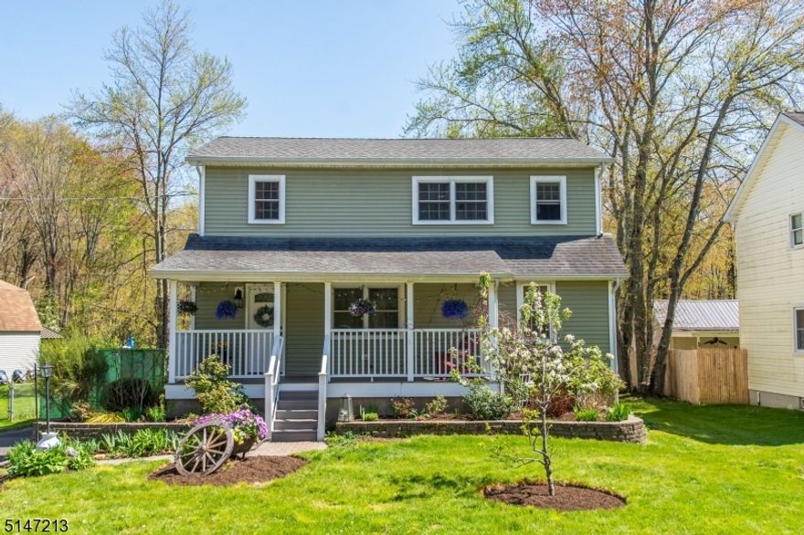 Back on Market: 7/9/22 Inspection done, no major issues, report available upon request. Commuter's Delight! Freshly Painted! This move-in ready charming colonial is within walking distance to the train station and local shopping/restaurants. Long Hill Twp. has top-ranked schools. This meticulously maintained home boasts a remodeled rocking chair porch (2019), new basement windows and steel door (2015), a young water heater (2016) and furnace (2010), mature perennial gardens and landscaping, a large level backyard with gravel fire pit, a large shaded deck that is great for entertaining, a young detached garage (2012), Roof (2009), and even a "Hobbit House." There is plenty of privacy as the home backs to a wooded lot and both neighbors have fences. High ceilings throughout and a flexible floor plan provides tons of possibilities for future owners. The eat-in kitchen has plenty of storage and counter space. Rounding out the first floor is a full bath, living room, and two bedrooms that could also be used as home offices, a den, or even a formal dining room. Upstairs is a sizable primary bedroom with multiple closets (including a walk-in) and an en-suite full bathroom. Also upstairs is the fourth bedroom and a large landing that could be used as an office, crafting space, or a reading nook. The walk-out basement has plenty of storage space.