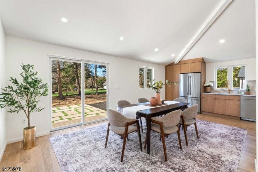 Welcome to 175 E Crescent Ave, an exceptional, fully reimagined residence offering approximately 3,200 SF where design, scale, and craftsmanship come together seamlessly. Featuring 5 bedrooms and 3 full baths, this home has been thoughtfully curated with high-end finishes and a layout that delivers both presence and practicality.The main living level is defined by a seamless flow between the kitchen, dining, and living areas, creating an expansive, light-filled environment designed for both everyday living and elevated entertaining. The kitchen is outfitted with premium materials, a center island, and modern appliances, all anchored by rich hardwood flooring. A wood-burning fireplace adds a refined focal point to the living space.The home offers a flexible layout, including a ground-level bedroom and full bath with a separate entrance, ideal for a variety of uses. Upstairs, the primary suite is complemented by additional bedrooms, baths, and a conveniently located laundry area.A finished walkout basement adds functional living space, while the outdoor setting, featuring a deck, patio, and yard, extends the home's livability. Additional features include central air, multi-zone heating, and a detached 3-car garage with ample driveway parking.A rare opportunity to own a home of this caliber, where quality, layout, and finish set it apart.