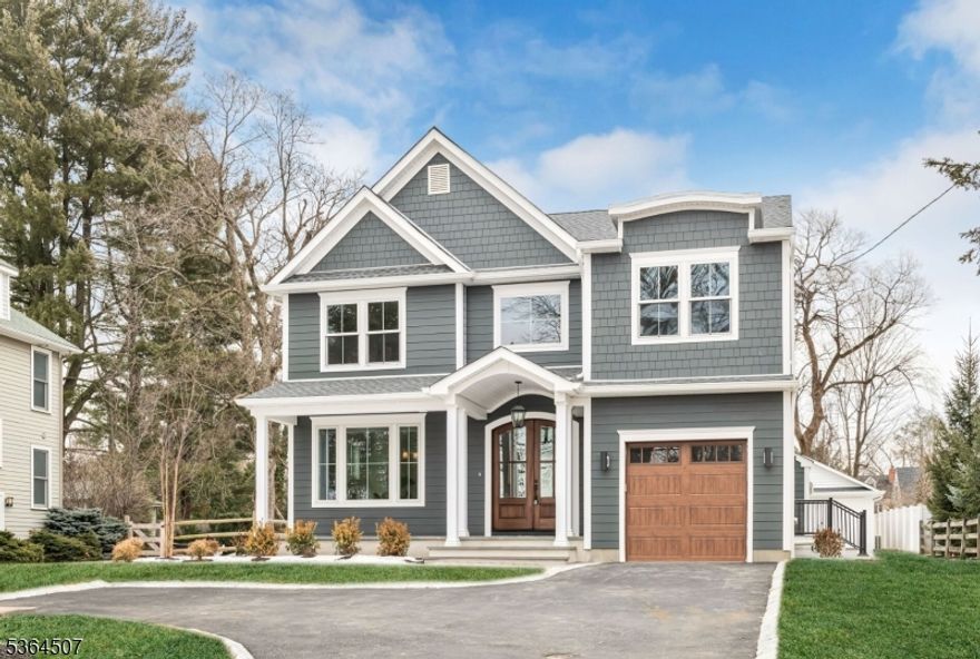 Experience exceptional craftsmanship in this new construction home by Canuso Homes. Spanning over 5,600 square feet of finished space, this residence offers 6 bedrooms and 5.1 bathrooms across four beautifully designed levels that seamlessly blend modern luxury with the historic charm of Ridgedale Avenue. The first floor features a formal dining room, a prep pantry, and a chef's kitchen ideal for entertaining, as well as a spacious living room with an entertainment wall. The second floor includes three bedrooms, each with an ensuite, ensuring privacy and comfort. On the third floor, two additional bedrooms and a full bath offer flexibility and space. Off the primary suite, a desirable private cove with a coffee bar provides the perfect morning retreat. The expansive basement mirrors the first floor's footprint, with an additional bedroom, full bath, and versatile space perfect for guests or gatherings. Outdoors, a fully restored 2-car garage has been transformed into an inviting outdoor living area, complete with a wet bar, finished space, half bath, and porch which is ideal for entertaining or relaxing in style.