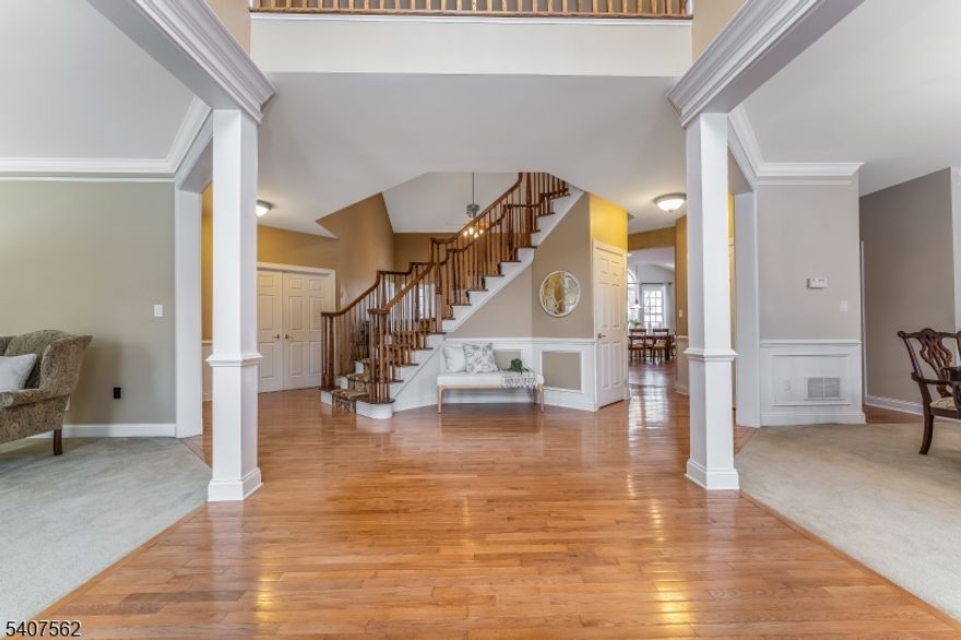 Stunning Bradford model on corner lot w/ mature trees & plantings in the highly sought after Waters Edge Community. This home will impress the moment you enter through the double doors to the grand foyer & open center staircase. Formal Living & Dining rooms are open to the foyer on either side, perfect for entertaining.  Walk around the center staircase to the great room w/ cathedral ceiling & gas fireplace which flows effortlessly into the large kitchen w/ new hardwood laminate floors, granite counters, tiled backsplash, walk in pantry, bar height counter & generous breakfast area overlooking back yard. French doors lead out to the deck w/ pergola. 1/2 bath & private office w/ a view of the back yard complete the 1st level.  2nd level has 4 bedrooms including a large primary suite w/ 2 walk-in closets, ensuite bath w/ double vanity & soaking tub. Upstairs the Balcony & Bedrooms 2 & 3 have winter views of Spruce Run Reservoir.  Take the "back" staircase downstairs for quick access to the kitchen. Unfinished basement with 9ft ceilings is perfect if you choose to expand your living place where sliders reveal a "walk up" to back yard. PUBLIC WATER, SEWER & GAS Prime location w/ commuting routes in every direction, great restaurants & shopping close by, top rated K-12 schools. Historic & charming Town of Clinton is 1 mile south & Spruce Run Reservoir is a stone's throw w/ great walking paths. The home has many extras throughout & is freshly painted. 400 Amp electrical service.