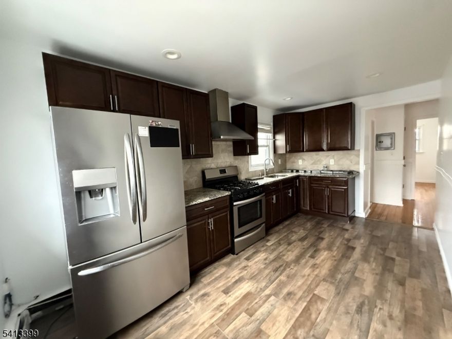 Beautiful and updated freshly painted 2nd-floor apartment, conveniently located near NJ bus transportation, shopping, restaurants, schools, and houses of worship. The apartment offers 2 good-sized bedrooms, a spacious living room, an eat-in kitchen, and 1 full bathroom. One parking space included, plus use of the backyard. Approx. 35?40 minutes to NYC. Sorry, no pets. Requirement credit/income verification. Available March 1st.