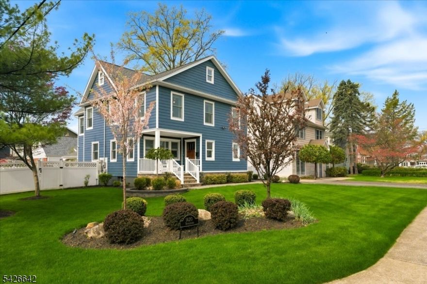 Welcome to 1420 Boulevard, where exceptional curb appeal and a welcoming front porch set the tone for this beautifully renovated Colonial on a prime Westfield street. From the moment you arrive, the home's charm and thoughtful updates create an inviting first impression starting with the beautiful custom millwork and designer finishes throughout. Inside, a light-filled, open-concept layout is designed for both everyday living and effortless entertaining. The gourmet kitchen features a Subzero refrigerator, Wolf stove and microwave, Bosch dishwasher, Zline hood, wine cooler, and a quartz center island, all flowing seamlessly into the main living area with a gas fireplace, rich hardwood floors, and detailed crown molding. The home offers 4 bedrooms plus a flexible first-floor office adjacent to a powder room, ideal for guests or a private office. Four upstairs bedrooms include custom built-ins, and the primary suite is a true retreat with a soaring cathedral ceiling and a luxurious en-suite bath. The finished lower level adds exceptional bonus space with a recreation area, beverage bar, powder room, and a hidden bourbon room. Outside, enjoy a fully upgraded backyard with a custom paver patio, covered pergola, firepit area, and beautifully landscaped grounds, perfect for entertaining or relaxing. With James Hardie siding, Andersen windows, and bluestone porches, this move-in ready home blends style, function, and location.
