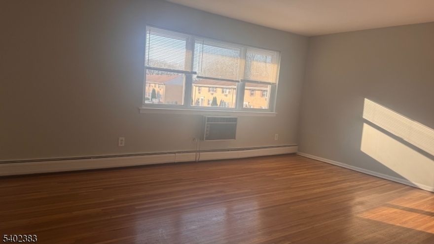 BEAUTIFUL ALL HARD WOOD FLOORS, FRESHLY PAINTED TWO BEDROOM APARTMENT, READY TO MOVE IN. GREAT LOCATION, COMMUTERS DREAM, CLOSE TO ALL MAJOR HIGHWAYS. ROUTE 80,10&46. RESTAURANTS AND SHOPPING AT WALKING DISTANCE.