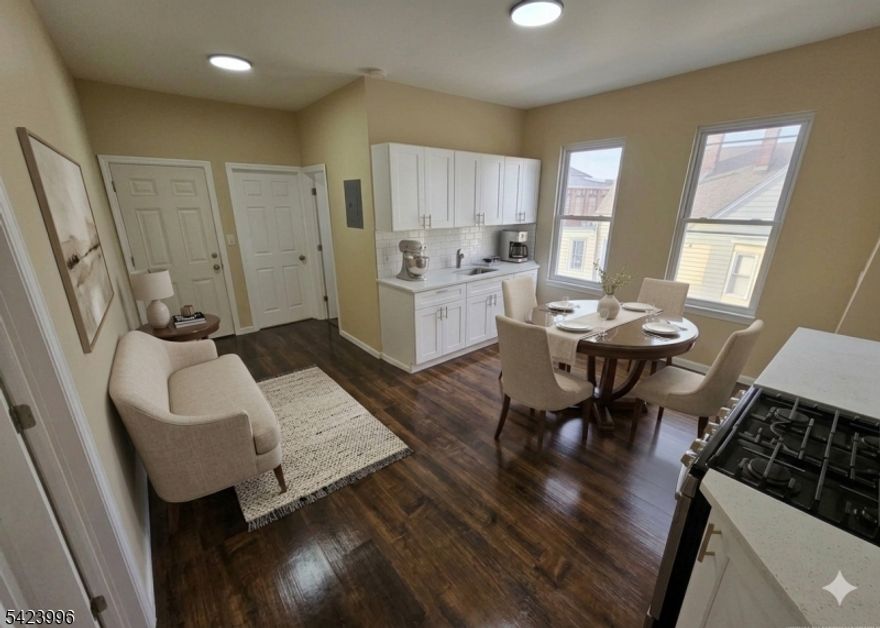 Step into this stunning apartment offering modern finishes and a fantastic layout. This unit features three spacious bedrooms, a bright and open living room, a contemporary dine-in kitchen, and two full bathrooms. Enjoy the outdoors with your own private balcony. Everything is brand new and ready for you to move right in! Secure, gated parking is available to residents for additional See Remarks. Don't miss this opportunity for high-quality, modern living!