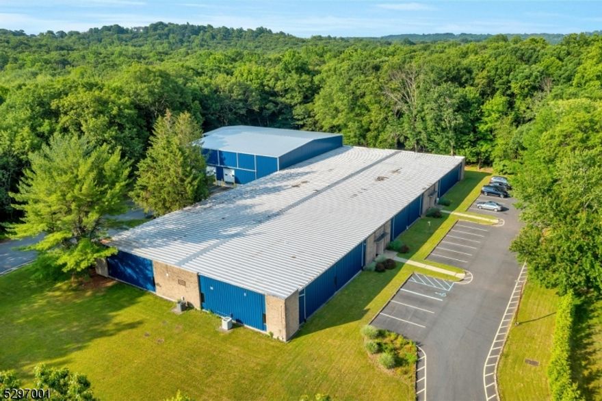 Secure a versatile 34,000 sq ft industrial space in a sought-after location. Ideal for light manufacturing, warehousing, distribution, or a combination of uses, this space offers a total area of 34,000 sq ft, including 3,900 sq ft of modern office and administrative space. It features updated HVAC systems and energy-efficient LED lighting, ensuring a comfortable and cost-effective environment. With high ceilings ranging from 15 to 24 feet, the space provides maximum flexibility for various business needs. Ample parking is available, making it convenient for employees and visitors. The strategic location offers easy access to Routes 46, 80, and 287, enhancing connectivity and logistical efficiency.