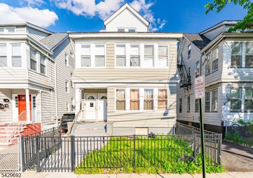 Welcome to 200 Munn Avenue in Irvington  a well located three family property offering a total of 5 bedrooms and 3 bathrooms, presenting a strong opportunity for both investors and owner-occupants seeking income-producing real estate. The property features a functional multi-unit layout designed to support a variety of rental strategies, making it suitable for steady cash flow and long-term investment growth. It also includes 6 off-street parking spaces with an exclusive driveway, adding convenience and strong tenant appeal. Conveniently situated near major transportation routes, schools, shopping, and local amenities, this property provides accessibility that supports consistent tenant interest and occupancy potential. Its location adds to its overall investment appeal and long-term value prospects. A solid addition for buyers looking to expand their portfolio or enter the multifamily market in Irvington, offering both income potential and future upside.