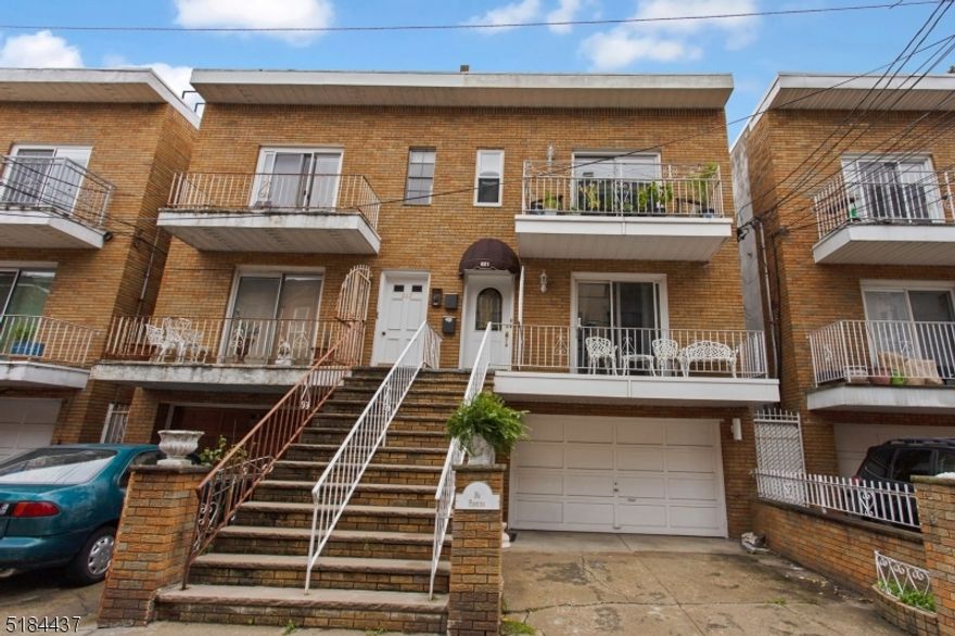 Here is your opportunity to own a Spacious Multi-family home in MOVE IN CONDITION. Located just 3 blocks from Washington St & just mins walk to the PATH. Not only is the Location GREAT but so is the home! This home has OFF STREET PARKING with your own GARAGE! The Garden level  "Level 1  (currently owner occupied will be delivered vacant) has 1 bedroom, kitchen, Living room, Full Bath, Garage Access, Laundry, Outdoor Living with a fully fenced in back yard. Level 2 and the Garden Level (L1) can be opened to one unit providing a mother/daughter set up with additional living space. Level 2 & Level 3 are similar to each other with 3 bedroom on each floor. Both providing a private balcony, 1.5 baths, Updated Kitchens & Baths. Hardwood flooring on L2 & L3 (under carpets also). Endless Possibilities await for you. This is truly a move in ready property. You are 1 block to the Park with a playground, basketball courts, dog park. Enjoy all Hoboken has to offer with fabulous dining, shopping and the best breathtaking views of NYC. Don't miss this one!