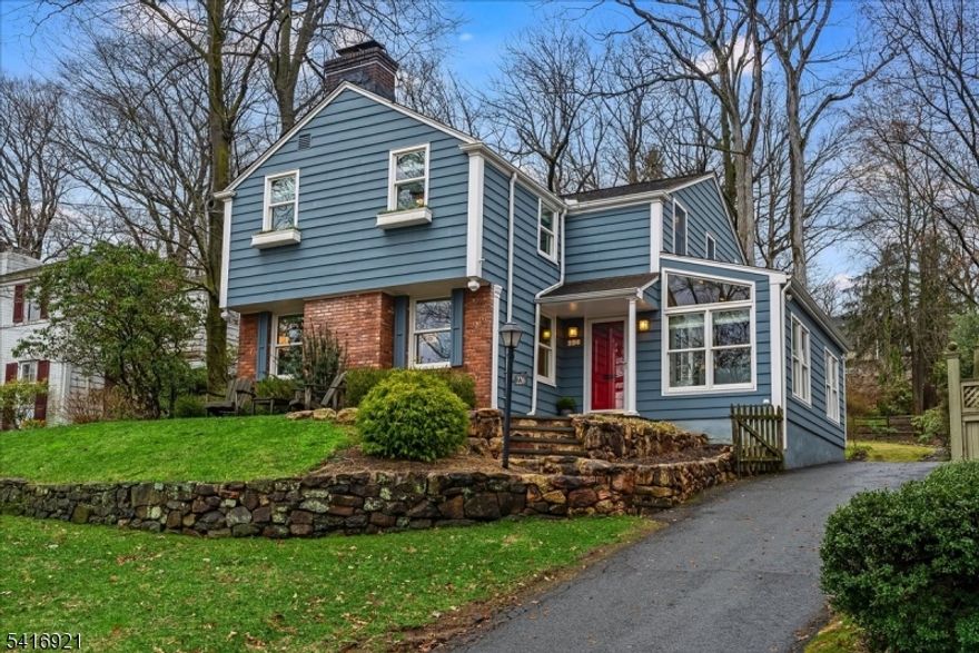 Beautifully renovated in 2025, 4-bedroom, 2.5-bath Colonial located in the sought-after Brayton neighborhood. This home blends timeless character with modern design and high-end updates throughout.The bright and spacious interior features gleaming wood floors and a flowing layout designed for today's lifestyle. The oversized kitchen was completely renovated in 2025 and showcases white cabinetry, quartz countertops, a Bertazzoni range, wine refrigerator, generous workspace and adjoining sitting room. The kitchen opens seamlessly to the dining area, creating the perfect setting for everyday living and entertaining. Multiple living spaces offer exceptional versatility, including a welcoming living room with beautiful built-ins and wood burning fireplace, large mud room and a highly desirable first-floor office ideal for working from home. Upstairs, the primary suite offers a peaceful retreat with window seats and an updated bath featuring radiant heated floors.Three additional bedrooms share a fully renovated hall bathroom with double sinks.Additional highlights include new HVAC and hot water heater. Set on a .21-acre property, the outdoor space includes a newly added patio, updated front and backyard steps, and retaining walls, a partially fenced yard and a dedicated dog run.The home also features an oversized garage with an electric vehicle charger. A wonderful opportunity to enjoy a move-in-ready home in one of Summit's most desirable neighborhoods.