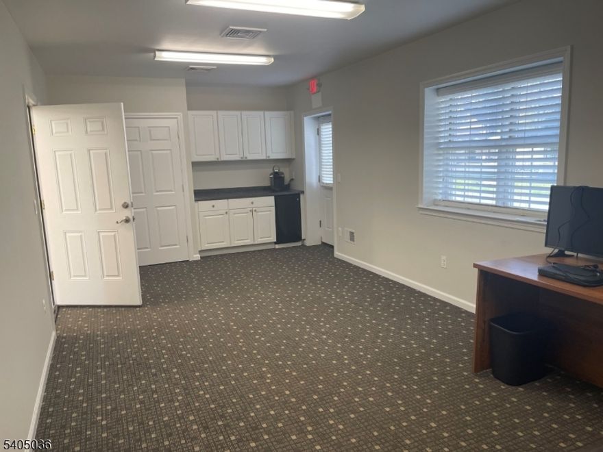 Move right in to this well maintained building! Unit A, 1st floor unit, offer's office space of 286 sq ft with it's own full bath, A/C,  garage area offer's 1/2 bath, gas heat, City water, City Gas, Separate utilities, over 5000 cars drive by daily!!