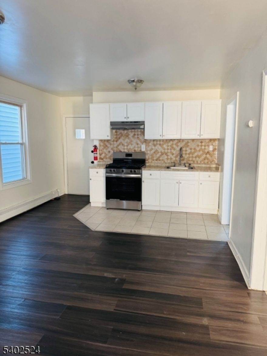 Welcome to this fully renovated four-bedroom apartment featuring two floors of thoughtfully designed living space. The home offers stylish upgrades throughout, including modern finishes, updated kitchen and bath, and spacious bedrooms filled with natural light. The two-level layout creates a comfortable flow and added privacy for shared living.