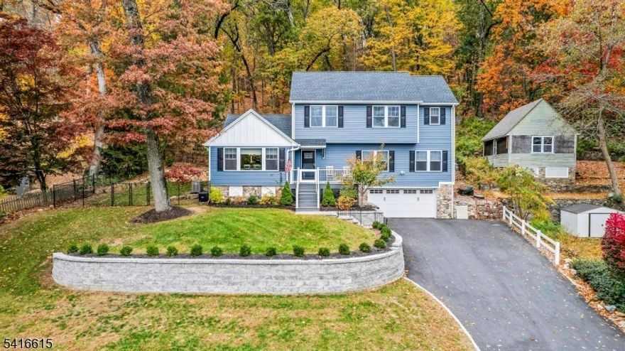 A must see builder grade home!!! This Colonial will impress - picture perfect location for this newer home offering all the amenities and value you could want for Denville and Cedar Lake. Home design was made for lake views from almost every room - The first floor offers open layout to Living Room and Formal dining  with breakfast bar/island separating the spectacular Kitchen. Your choice for swing room - 4th Bedroom or ideal work from home office with full bath. Second floor Primary has beautiful Bath and walk in closet plus 2 other Bedrooms with additional hall bath. The rear yard and patio with fire pit are very private with full chain link fence set up for your furry friends. Professional landscape design and stone work on walls is execptional. Will not last long - super must see!!!