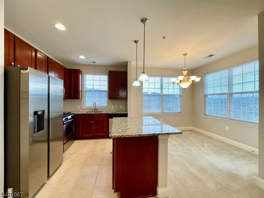 LIVE THE GRANDE LIFE! Available Feb 2nd.    "Hickory" model 2 bedroom, 2 bath condo on the 3rd flr w/1152 sf of elegant living space & amazing mountain views! Private end unit located just steps away from the side entrance. Assigned parking space in garage with additional parking outside. Featuring 2 bedrooms w/walk-in-closet each bedroom. The primary bedroom has a full bath. There is a computer room/office. Bigger kitchen w/center island, beautiful kitchen cabinets, granite countertops & SS appliances. Balcony off kitchen. Laundry room accommodates full size washer & dryer side by side! Live the Grande life and enjoy all the Grande amenities which include 2 clubhouses, 2 pools, billiards rm, tennis & basketball courts, fitness ctrs., & much more. Assigned parking in grge. Add'l parking. Required lease application, credit check, employment verif. Credit score 700+, 1st mth rent & 1 1/2 mth security dep. $400 Grande move in fee & $750 refundable sec dep. No Smoking. No Pets.