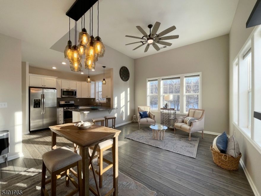 Welcome to Brookland at Lakepointe- this spacious, bright condo with an open floor plan offers two bedrooms, two full bathrooms, and a lifestyle of fun and convenience just steps away from Lake Hopatcong. Meticulously maintained, this desirable third floor, top unit blends low maintenance living with the charm of lake life. Enjoy walking distance to waterfront dining, the towns beloved ice cream shop, and endless activities - boating, swimming, fishing, shopping, and more. Inside, numerous updates include- luxury laminate flooring, stainless steel appliances, granite countertops, 9 foot ceilings, recessed lighting, ample closet space, and an in-unit washer/dryer. Full size garage for extra parking or storage for all of your lake toys. Comfort is ensured with a high efficiency HVAC system, reverse osmosis water filtration system, intercom/key fob entry, and a dedicated paved parking lot. Conveniently located near routes 80, 46, and 287 for easy commuting. For even more lake enjoyment, residents have the opportunity to join Crescent Cove Beach Club with Seasonal memberships available. This condo delivers the perfect blend of style, location, and lakefront charm. Ready for immediate occupancy - No Smoking and No Pets