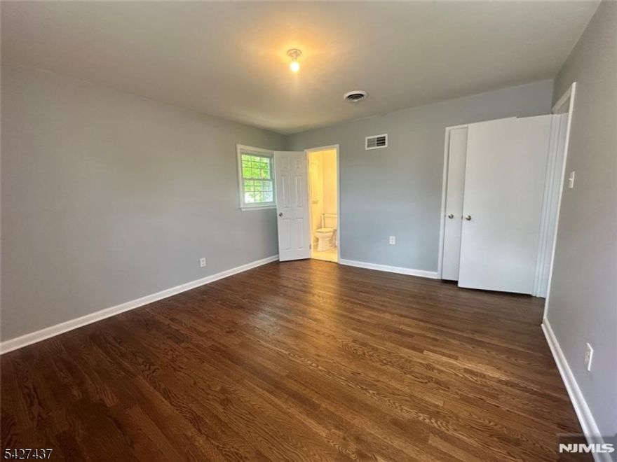 Welcome to your dream home! Don't miss out your chance to own a Home in One of Clifton's Premier Neighborhoods! Beautiful and renovated split level with oversized lot and attached garage. This perfectly maintained 3-bedroom, 2 and a half bathroom home offers a perfect blend of comfort, style, and convenience. First floor offers a comfortable living and dining area and eat-in kitchen. Second floor has two spacious bedrooms, modern full bathroom and a master bedroom with full bathroom. Hardwood floors, fenced in backyard - this home is truly move in ready! Come for a showing and stay for a lifetime!