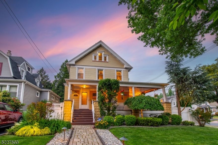 Stunning Large Colonial with Architectural charm on large corner lot, with 2 Car Garage and Driveway! This home has been meticulously updated and features a spacious layout, high ceilings, wood floors, architectural moldings/doors/hardware, and 4 levels of living. Beautiful wrap-around front porch perfect for enjoying your cup of coffee in the morning, spend lazy afternoons relaxing, or entertaining in the evening. As you enter the spacious foyer you're greeted by a beautiful Chestnut staircase and stained glass window, a Living Room, and a Dining Room with bump out. The Eat-in Kitchen and Butler's Pantry offer plenty of space for preparing meals and storage. Half bath completes this level. The second level has 4 generous bedrooms and a full bath. The third floor walk-up attic offers an office and the possibility to finish the remaining space for additional living, or keep it as is for storage. The basement has an amazing family Room currently set up as a sports bar theme, and an unfinished storage/laundry area w/ plumbing for an additional toilet. The Oversized 2 Car Garage including a loft, offers plenty of space for for your vehicles and storage, and park up to 4 cars in the driveway. Two Zone Central AC & Two Zone Forced Hot Air Heating. 5-zone Sprinkler system. Landscaping lighting. Conveniently located within close distance to center of town, transportation to NYC, Kean University, Newark Airport, Garden State Parkway, and Route 22. Don't miss this home!