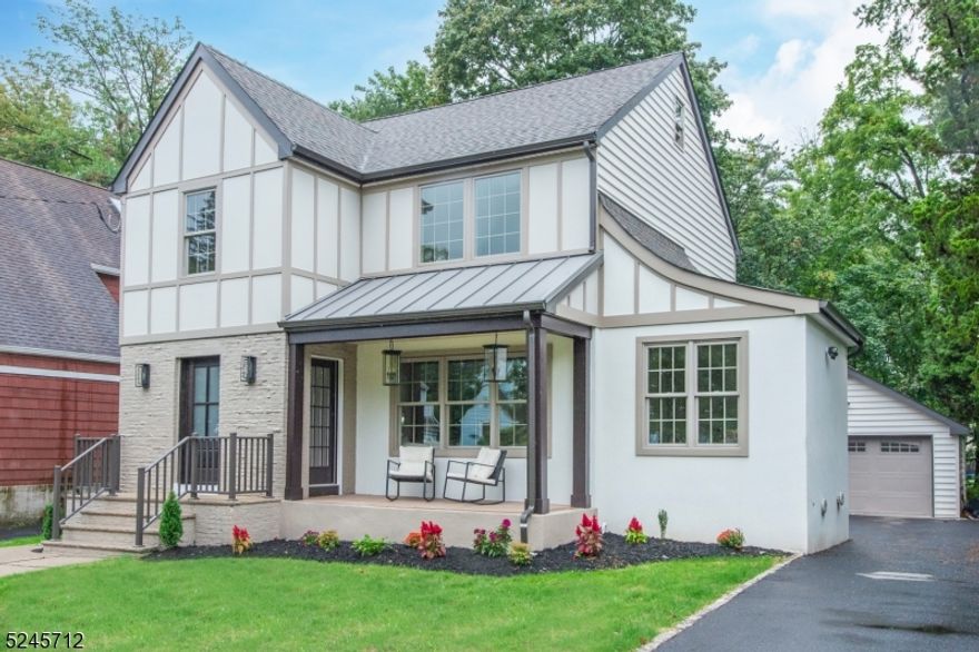 ALL ABOUT THE DETAILS! Discover the epitome of elegance & care free living in this HGTV-design-worthy custom NEW BUILD, right in the heart of Millburn. Every meticulous detail has been carefully curated to create a home that transcends expectations, marrying modern luxury & historic charm. Step inside, you'll be greeted by warm white oak hardwood floors. The chef's kitchen is a masterpiece, w. expansive breakfast bar center island, adorned w. waterfall quartz, illuminated by high-end SS appliances & exquisite gold detailing. Luxury lighting, enchanting chandeliers, & opulent wall coverings make this residence a designer's dream come true. Preserved original arches highlight the timeless character. Open-flow layout & convenient first-floor office offers a serene escape for working from home, ensuring both productivity & tranquility. Upstairs, the master suite awaits, w. private en-suite spa bath & Bluetooth speakers for an immersive experience. Enjoy second-floor laundry room & large guest bedrooms. The fully finished third floor boasts an additional bedroom, providing ample space for guests. Finished basement extends the realm of entertainment or serves as a versatile en-suite, complete w. a full bathroom & den. Even the 2-car detached garage has been pre-wired to charge your EV. NOT in a flood zone. Enjoy the privilege of NJ's best-ranking schools. With close proximity to train, easily access NYC while savoring the tranquility of Millburn's cherished community. Welcome home!