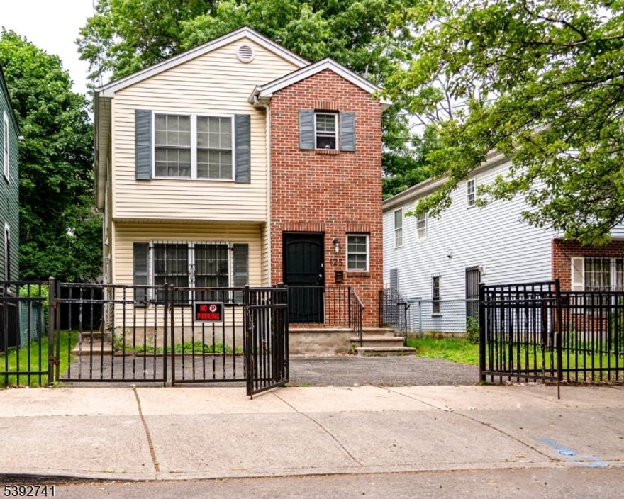 Nestled on South 8th Street in Newark, this 1st Floor Unit offers exceptional value and versatility. Built in 2004 and updated in 2025, the home reflects true pride in ownership. Enjoy 2 bedrooms and 1 full bathroom. The unit is filled with natural light and designed for easy, everyday living.  Unit has a private, side door entrance. A standout feature is the gated parking area that accommodates one vehicle for the unit--an increasingly valuable amenity in the city. This home checks all the boxes and is located near University Hospital, transportation, shops, and local conveniences. Background and credit check (NTN Application preferred), Rental Application, 3-month's of proof of income, job verification letter, and 3-months of bank statements required.