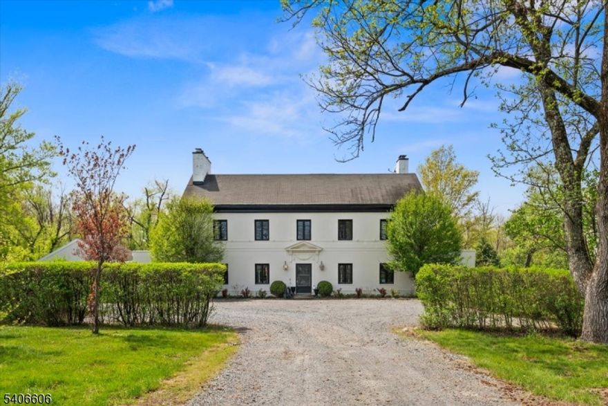 A timeless 1920's manor estate showcasing old world charm seamlessly enhanced with modern conveniences,set on 13 private acres just minutes from downtown Princeton.A long,treed lined driveway leads to this elegant three story residence offering 6 bedrooms,including a luxurious primary suite with wood burning fireplace,private balcony and an exceptional custom walk-in closet.This gracious manor features four wood burning fireplaces located in kitchen,library,livingroom,and primary suite.Original architectural details including pocket doors,French doors,refined millwork,and bluestone terraces-wordly craftsmanship and enduring character. The home is filled with ideal east to west lite,creating warm and inviting living spaces throughout. The newly designed kitchen incorporates today's modern amenities while honoring the home's historic elegance.features include an oversized center island with quartzite counter ,kohler farmhouse sink,Thermador appliances,custom millwork,and a wood burnig fireplace.The kitchen opens to the living room with built in bookcases,customlighting,and French doors leading to the sunroom and library,Home ideal for both everyday living and entertaining.A breezeway converted to custom mudroom with Custom Pottery Barn like organizational cubbies,perfect for bags,jackets,shoes,and sports equipment.The main level has a carriage house apartment offers private entrance and separate utilities perfect for guests,home business or,gym-Pool house-3 car detached gargae